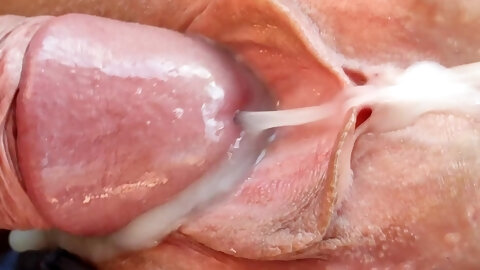 Step brother fucks married step sister and cums on her pussy. Close-up.