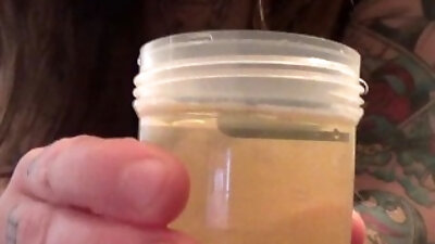 Young Elle Pisses In A Cup, Smells It, & Then Dumps It On Her Ass