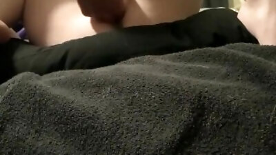Fingering her while she jerks me off