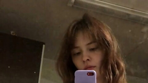 Smooth pussy shows pussy in the mirror.