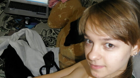 Amateur girl with a nice bum stripping and posing in the mirror